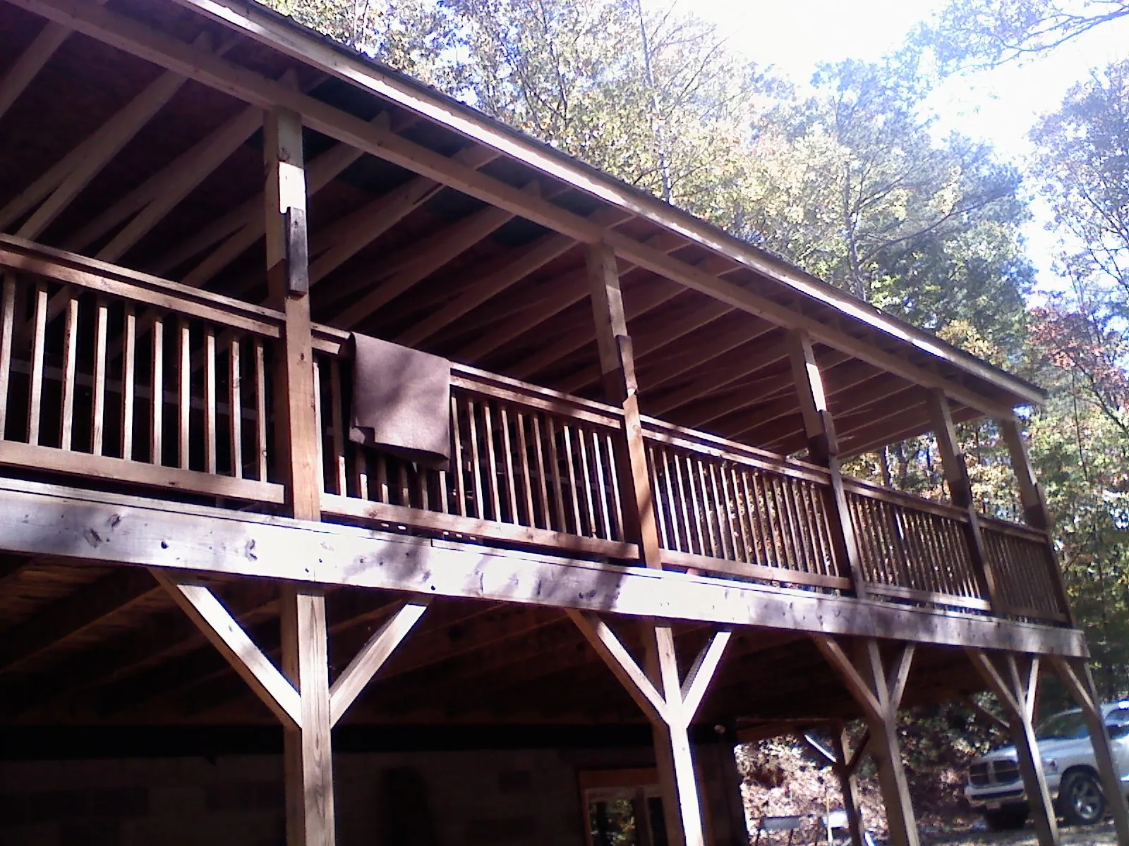 Timber framing under a new elevated porch and deck — Roof Leak Repair in Belgrade by Roofing Brothers